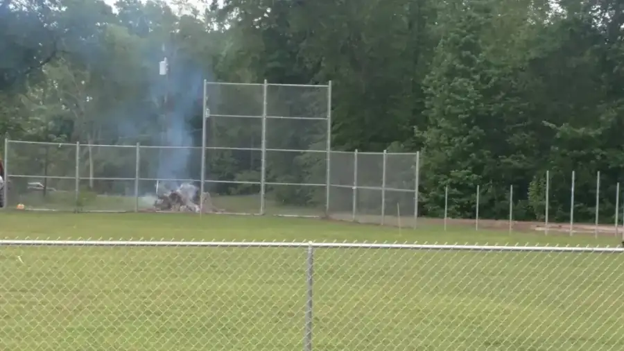 Chain link ballfield backstop installation